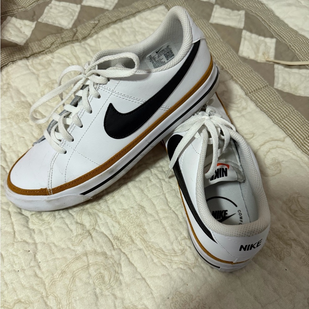 Youth Nike White Mesh Sneakers with Black Logo